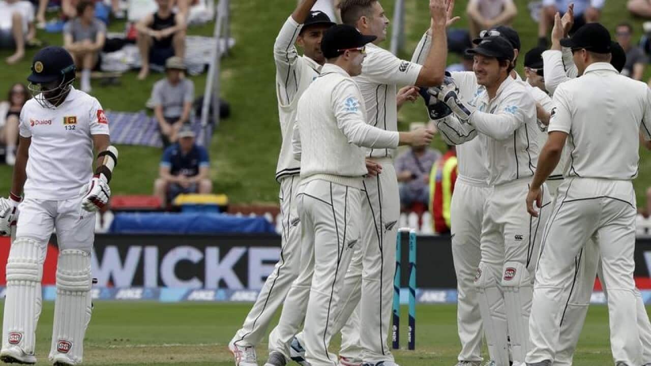 Tim Southee is congratulated by teammates