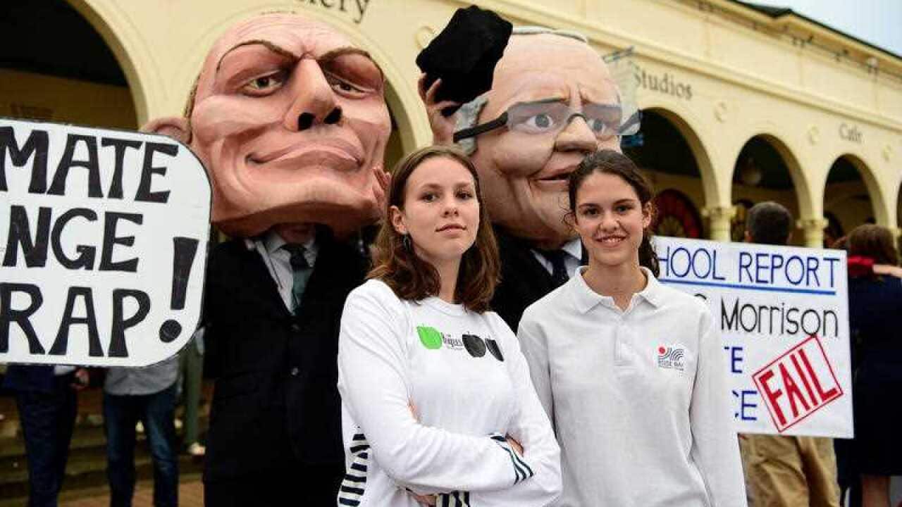 Event organisers Lucy Achhorner, 18, and Elena Palombi-Luff, 15, at a climate protest outside Bondi Pavilion.