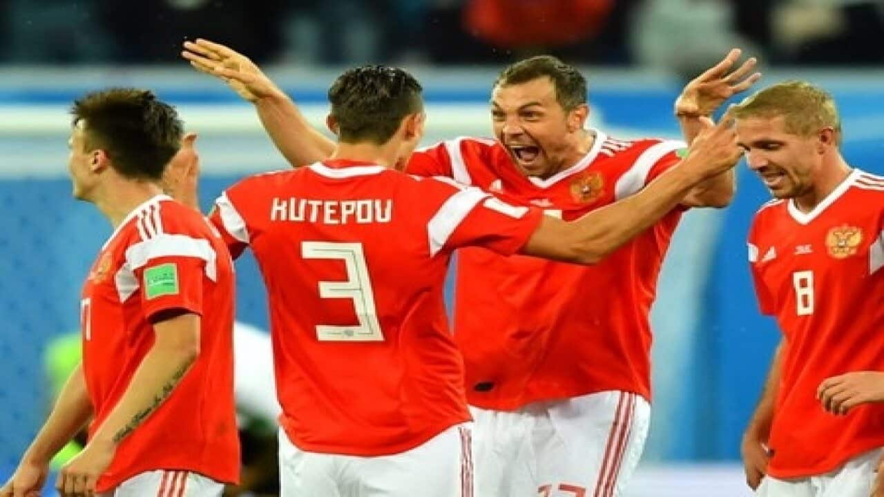 Russia on brink of knockout stage after win over Egypt