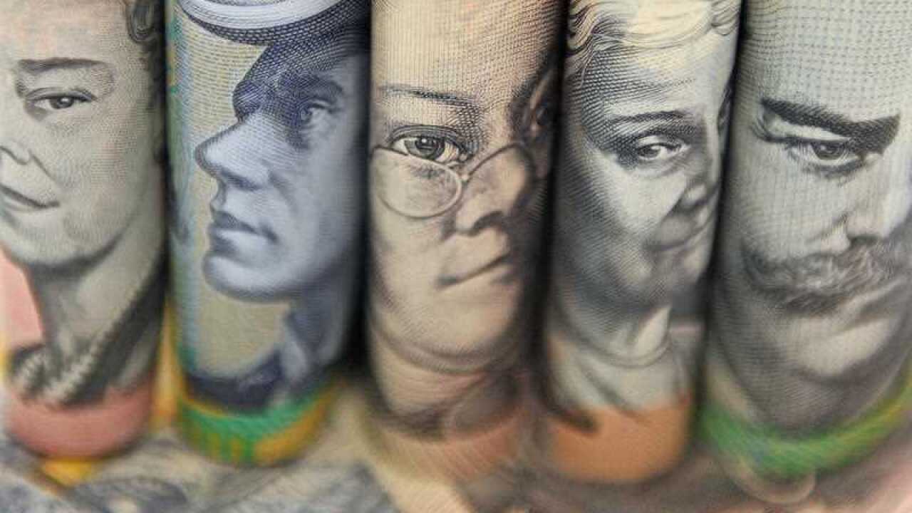 Australian currency pictured in Sydney, Thursday, Sept. 11, 2014. (AAP Image/Joel Carrett) NO ARCHIVING