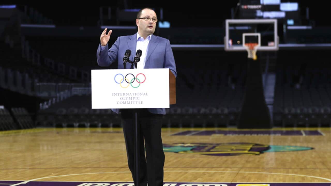 Patrick Baumann speaks during a news conference at Staples Center
