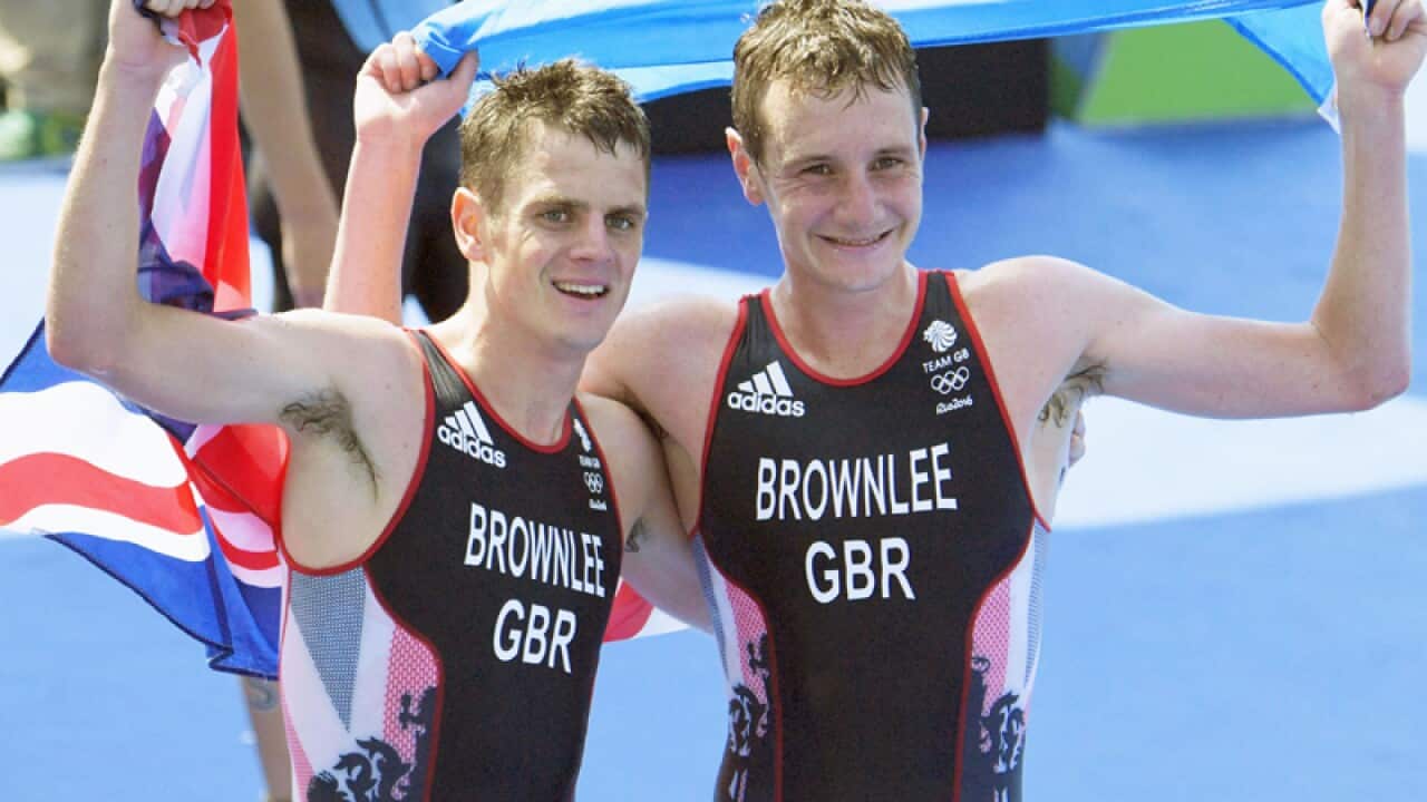 British brothers Alistair Brownlee (R) and Jonny