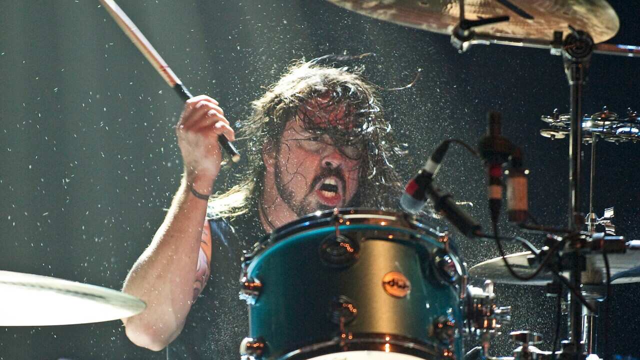Dave Grohl invites 10-Year-Old Nandi Bushell to perform with Foo Fighters after an epic drum battle