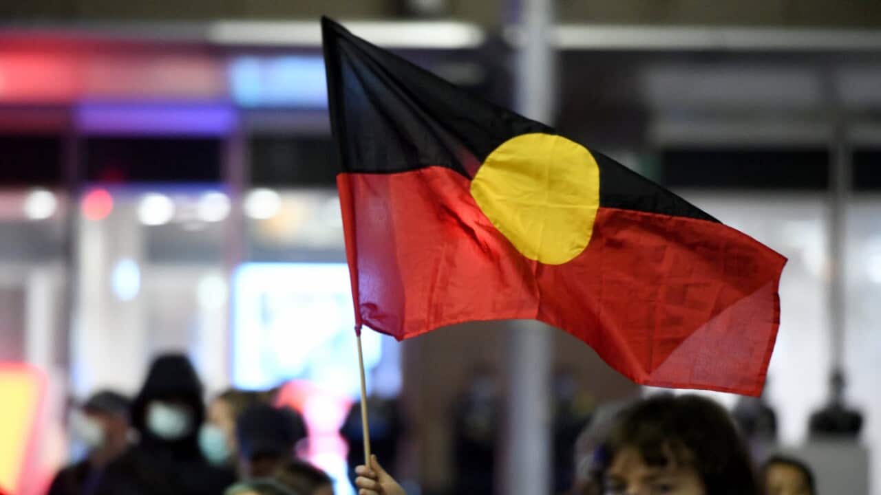 An Aboriginal flag is seen being flown in Sydney