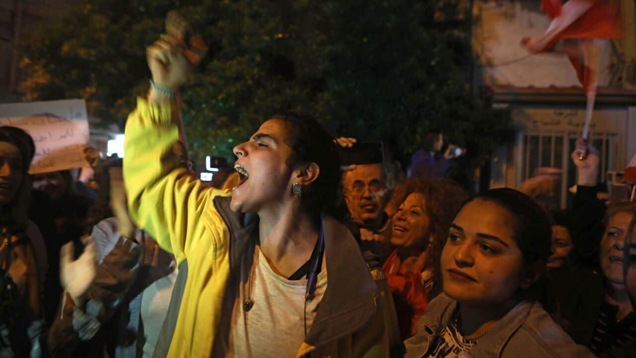 Lebanese women, from the Chrisitan-dominated area of Ain al-Remmaneh and Shiite-dominated neighbourhood of Shiah, shout slogans in the streets.