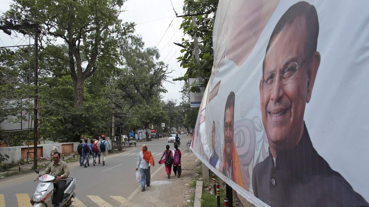 A political poster features an image of Hindu politician Jayant Sinha in Hazaribagh, India.