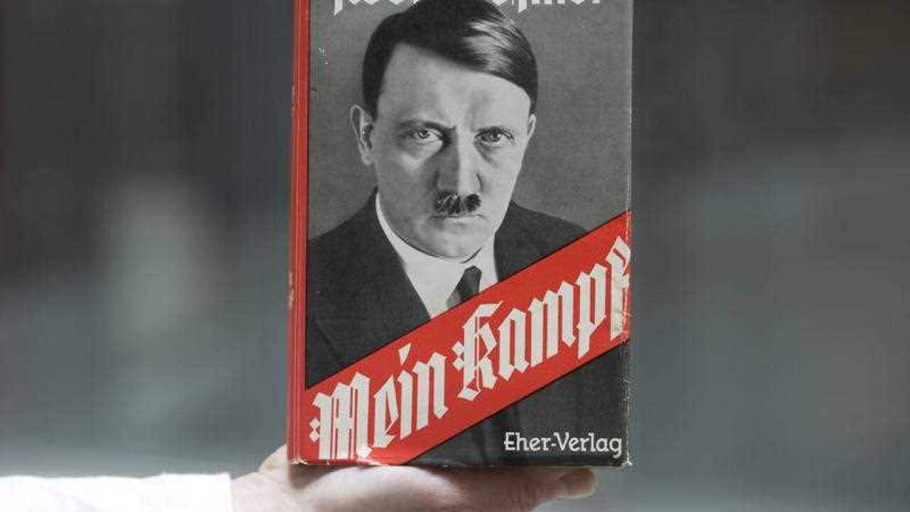 Adolf Hitler's infamous memoir "Mein Kampf" is presented during a news conference in Nuremberg, southern Germany, Tuesday, April 24, 2012