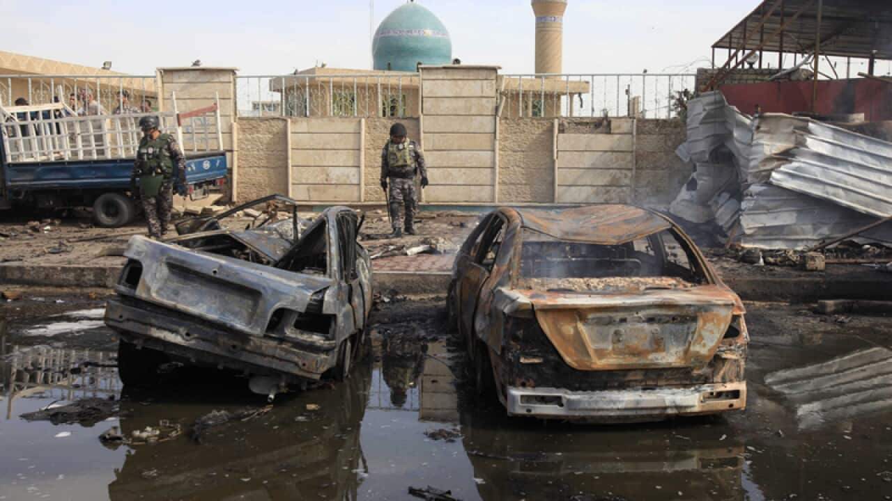A parked car bomb exploded near the al-Mahdo mosque in Baghdad on Friday March 29, killing or wounding several worshipers. (AP)