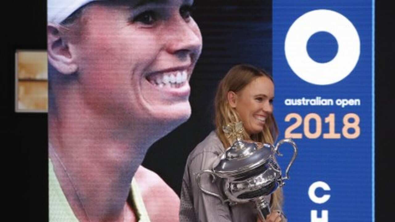 Wozniacki ends long wait for first grand slam title