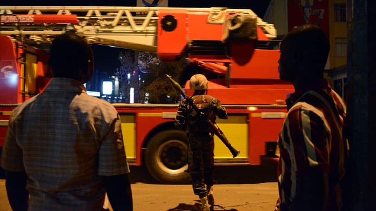Burkina Faso's soldier stands near Hotel Splendid