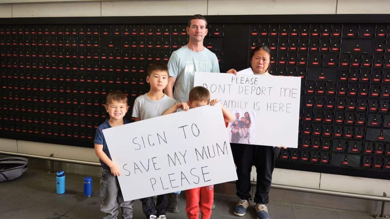 Ben Cox, Ying-Hsi Chou and their children collect signatures outside Murray Bridge Marketplace on Saturday