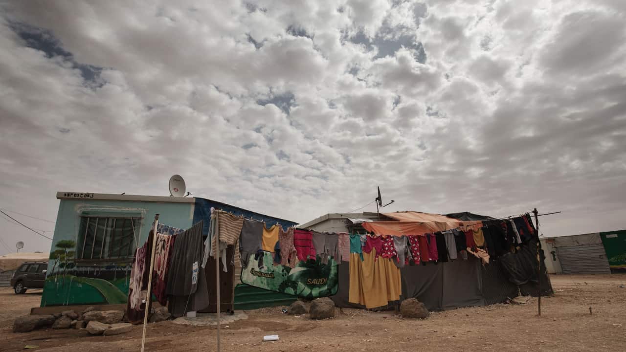 Washing drying in front of a more permanent house in Zaatari refugee camp located in northern Jordan, just 10km from the Syrian border.