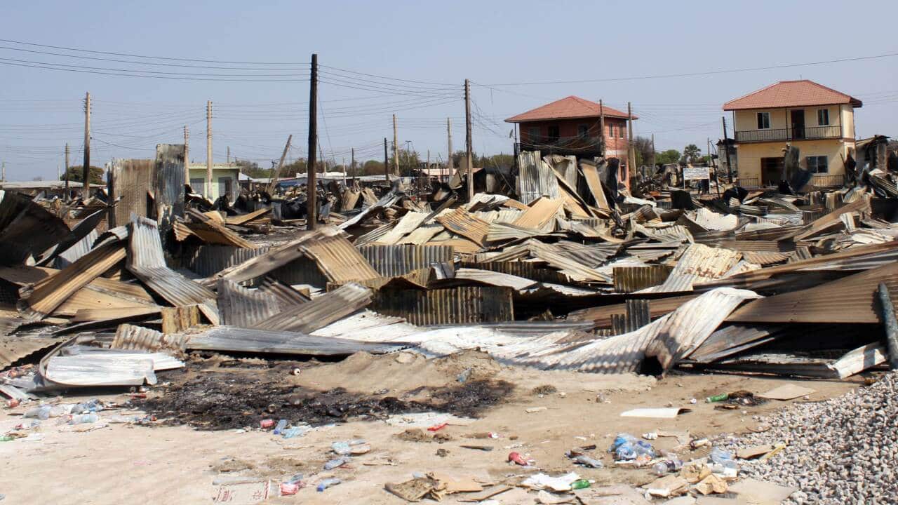 The remains of the market in Bor, which the government says was set alight by rebels - AAP-1.jpg
