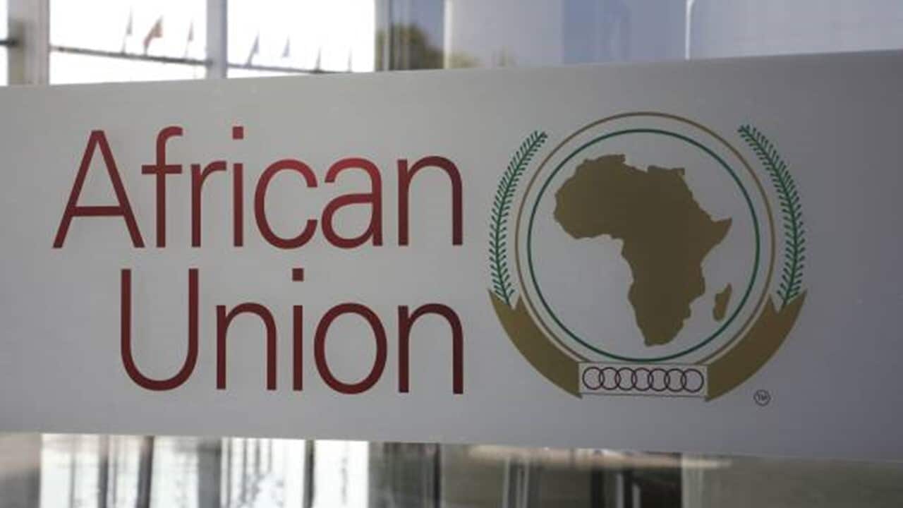 The logo of the African Union (AU) is seen at the entrance of the AU headquarters.jpg