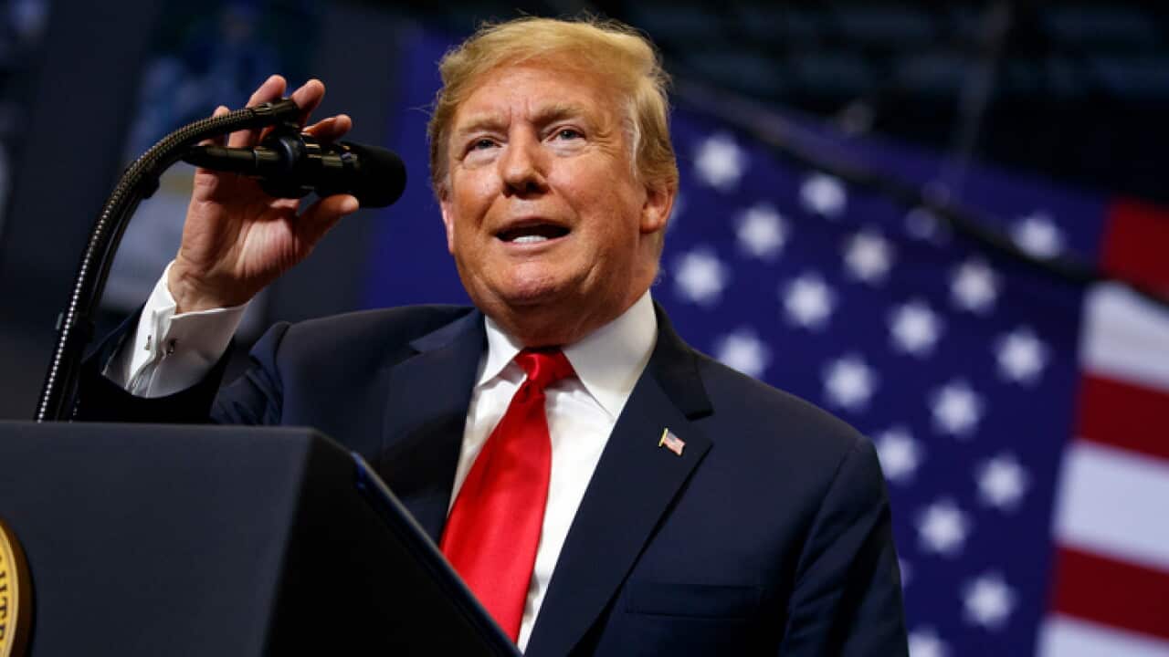 US President Donald Trump at a campaign rally in North Dakota
