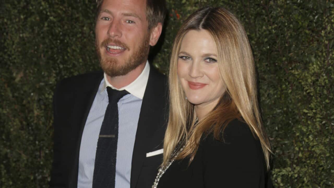 Actress Drew Barrymore and her husband Will Kopelman