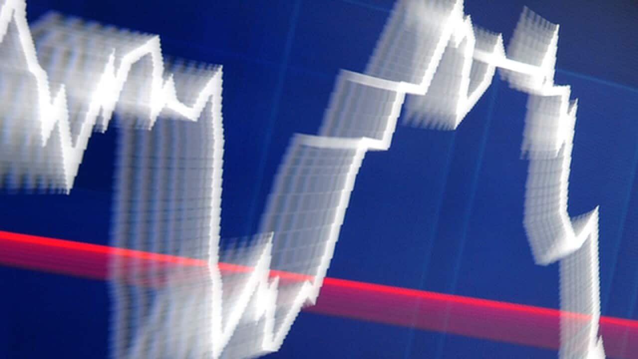 An information board illustrates movements in share prices