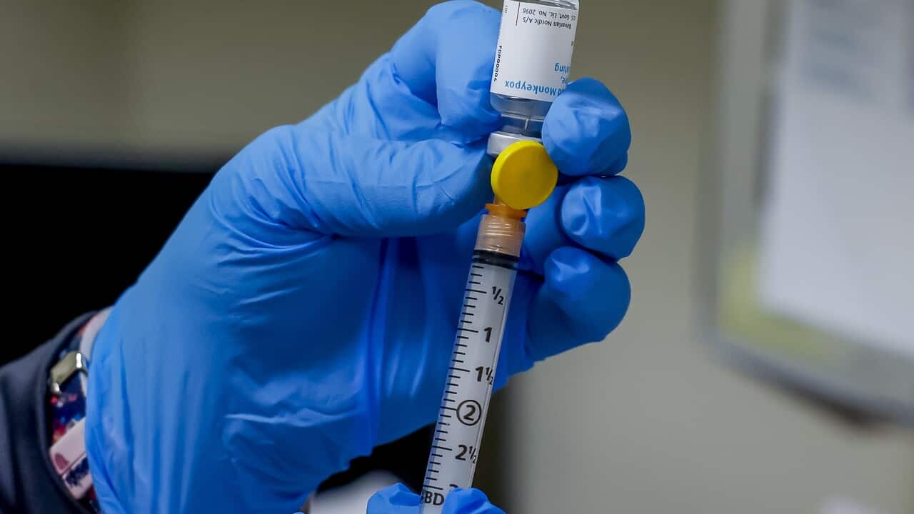 a syringe with a dose of the monkeypox vaccine