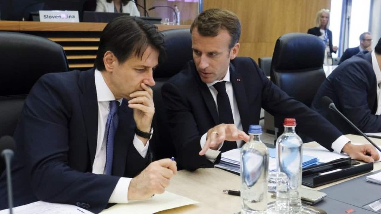 Italian Prime Minister Giuseppe Conte (L) and French President Emmanuel Macron (R) attend the informal meeting on migration and asylum issues in Brussels.