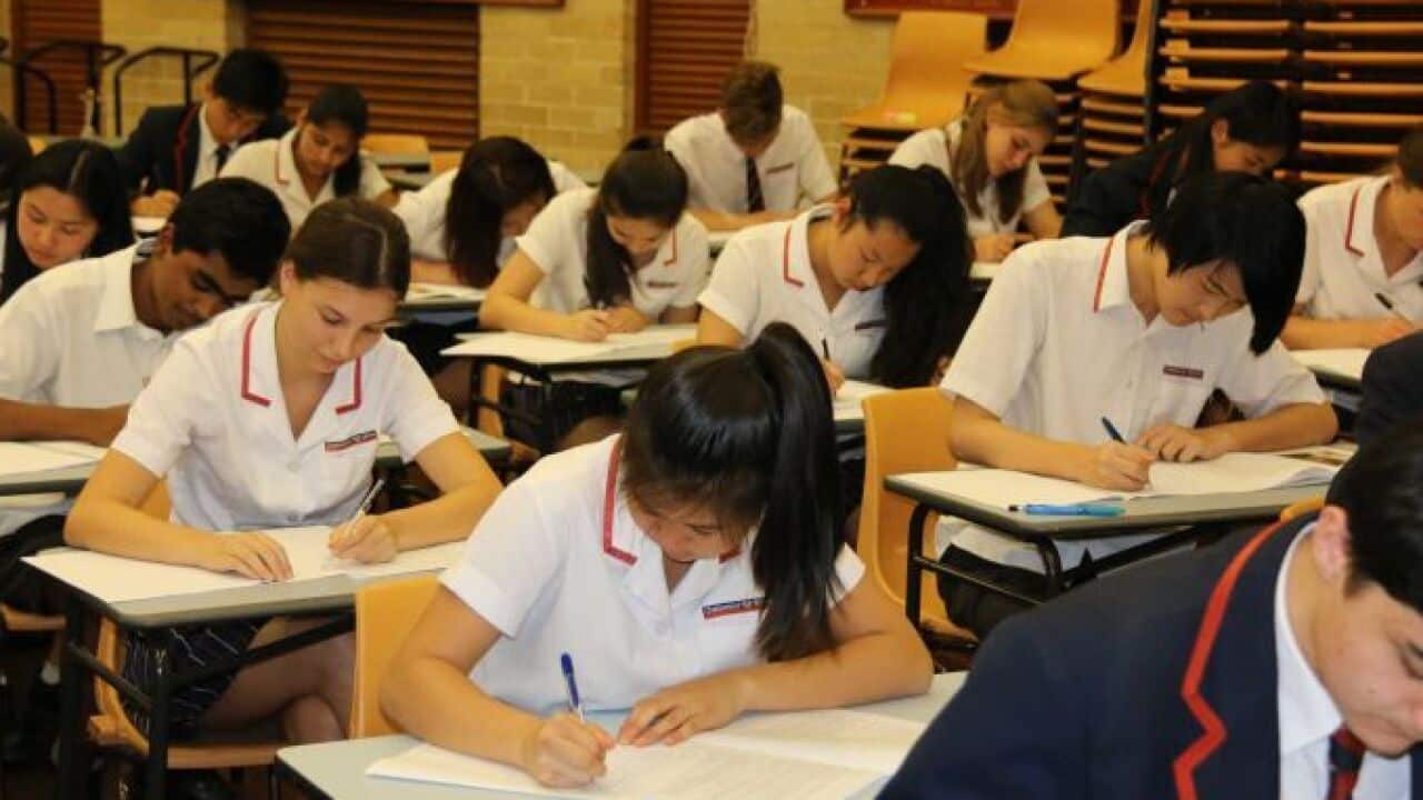 NSW on edge as school clusters grow.