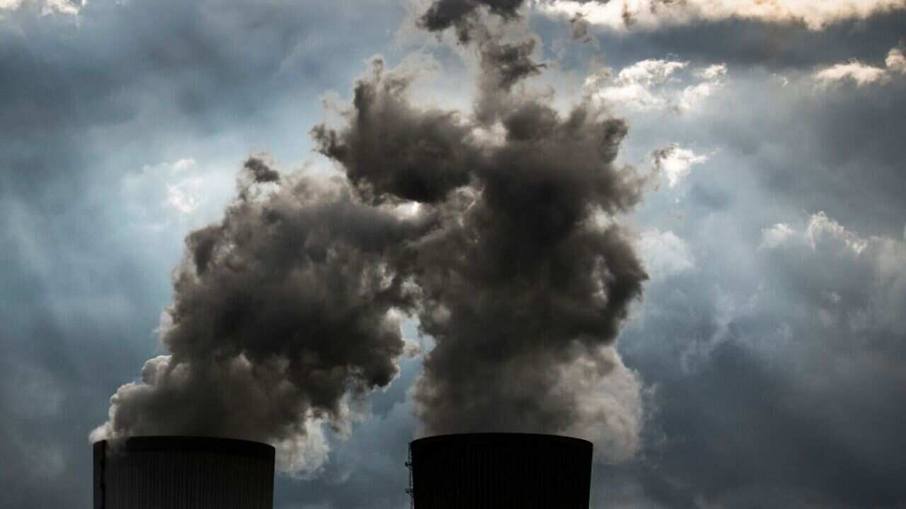 The lignite-fired power station of Boxberg is captured in front of an upcoming thunderstorm on June 25, 2017 in Boxberg, Germany.