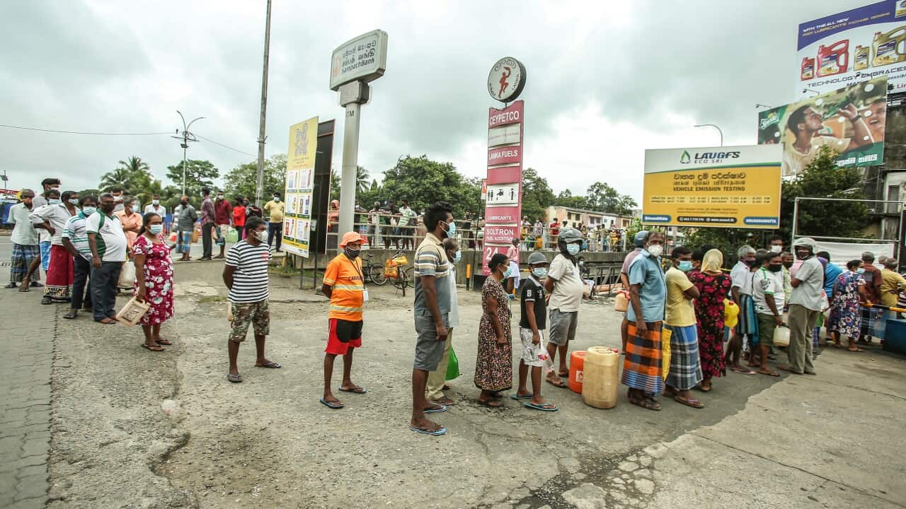 People waiting in queues to purchase kerosene near fuel stations at Colombo, Sri Lanka during a country-wide lockdown due to spread of Covid-19 on Sunday, August 22, 2021