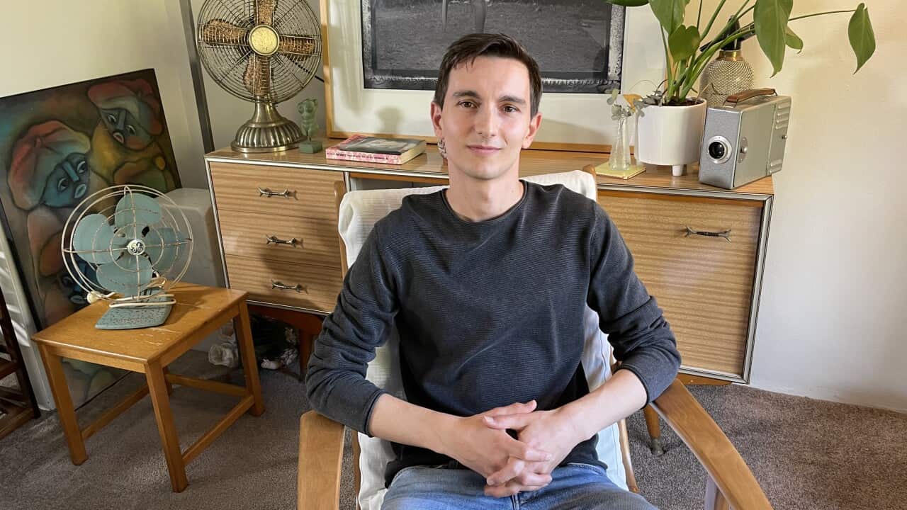 Leonardo Urbano sitting in his flat