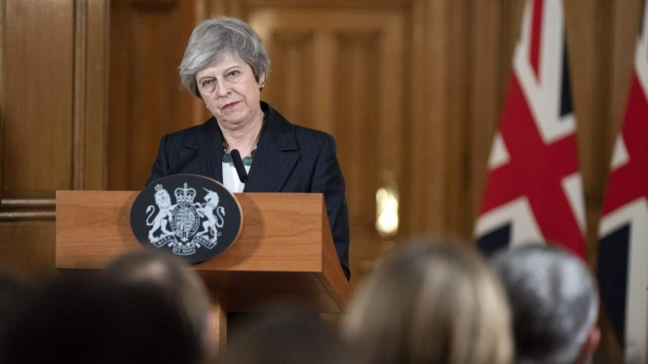 British Prime Minister Theresa May, delivers a statement during a news conference inside number 10 Downing Street in London.