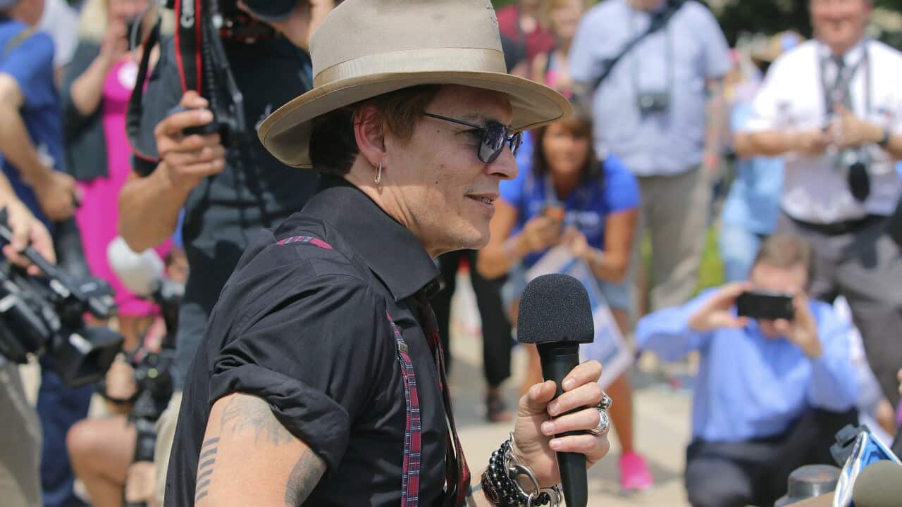 The actor Johnny Depp speaks at a rally on the front steps of Arkansas' Capitol on Friday.