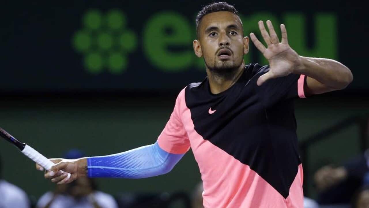 A file image of Nick Kyrgios, of Australia, returning a shot.