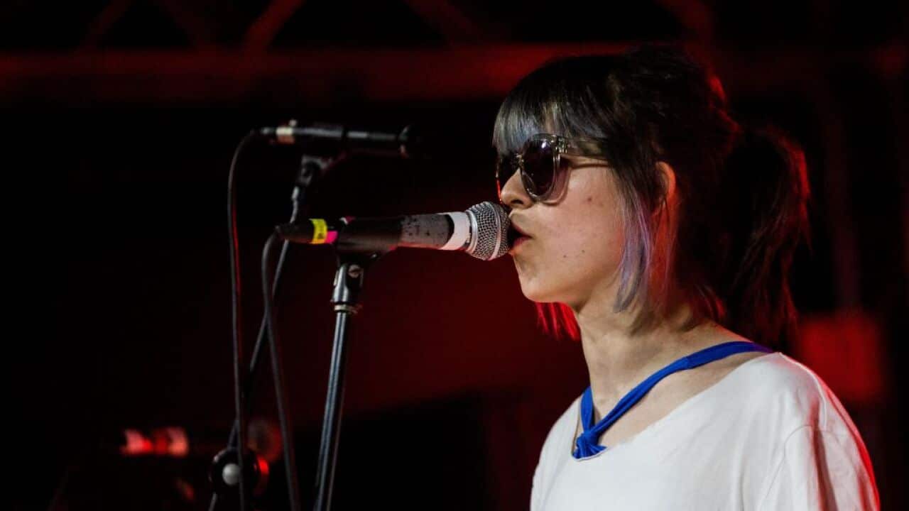 Nadya Tolokonnikova of Pussy Riot performing in Milan, Italy