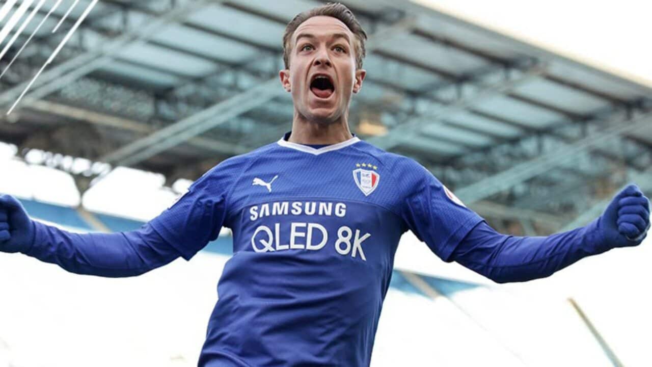 Adam Taggart celebrates a goal for Suwon Bluewings