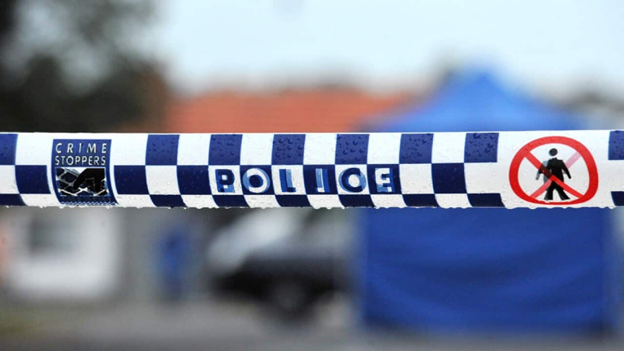 Police tape restricts access to a crime scene north of Sydney,