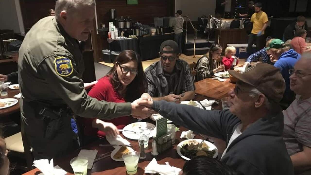 Bunte County Sheriff Kory Honea greets Paradise evacuees