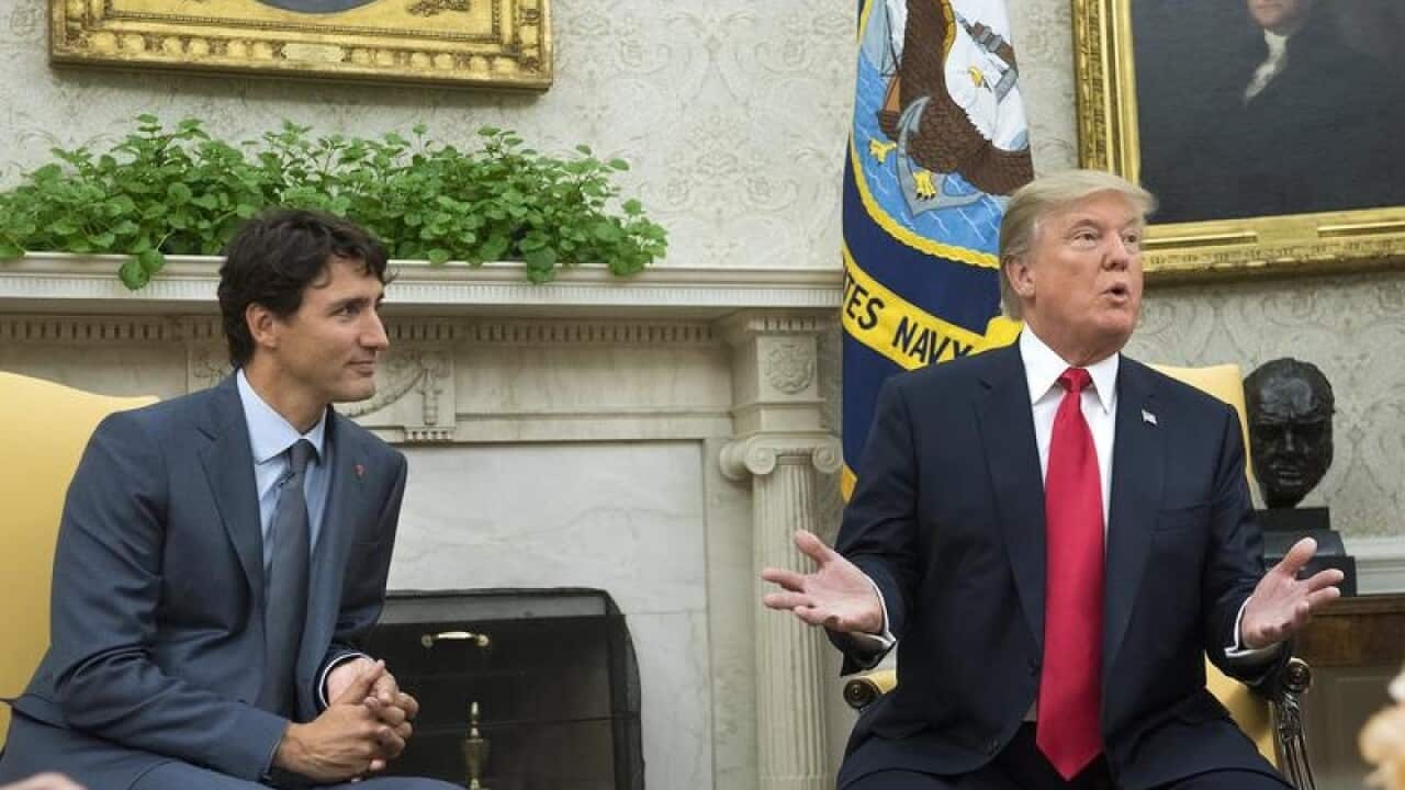 US President Donald J. Trump speaks with Prime Minister Justin Trudeau