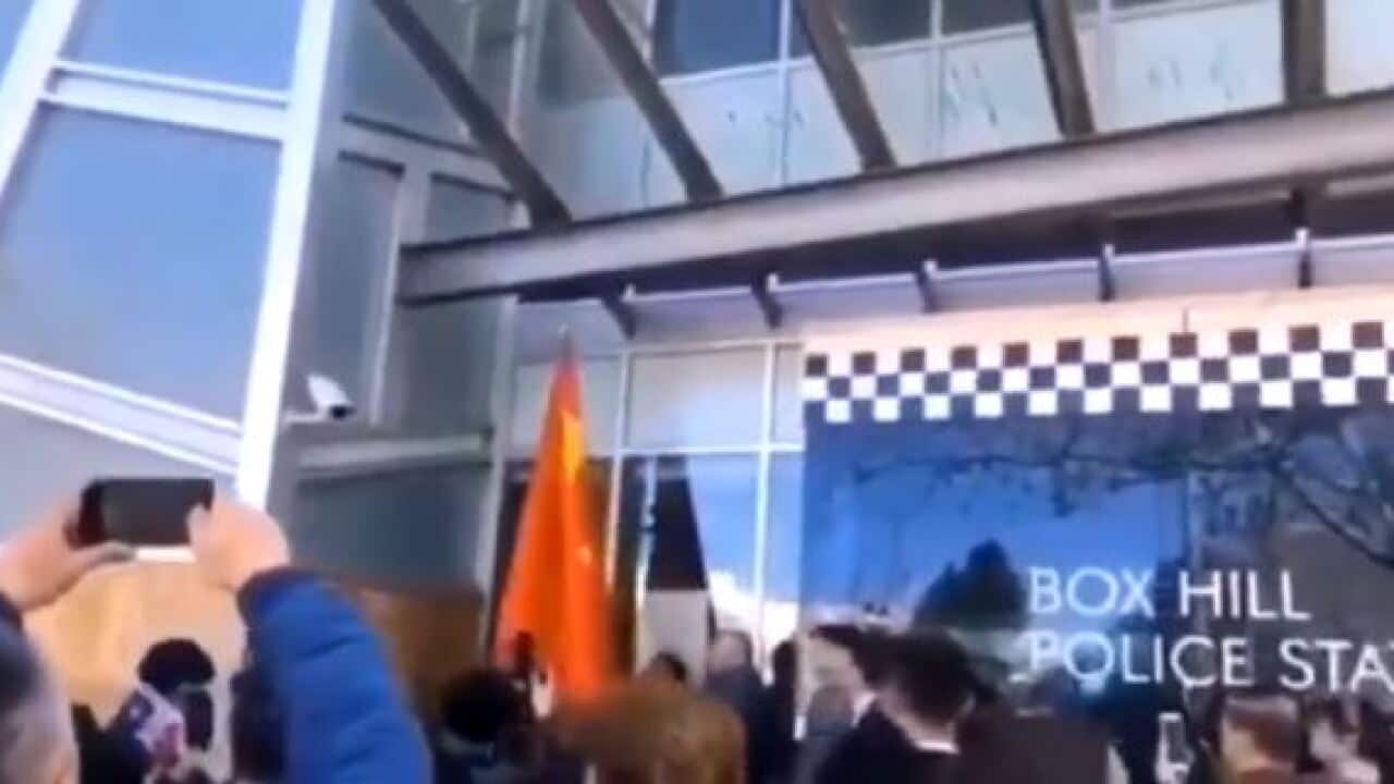 Victoria police lambasted for raising Chinese flag