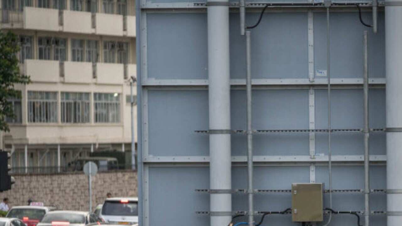 Critics fear any extradition agreement could leave both business figures and dissidents in Hong Kong vulnerable to China's politicised courts (AAP)