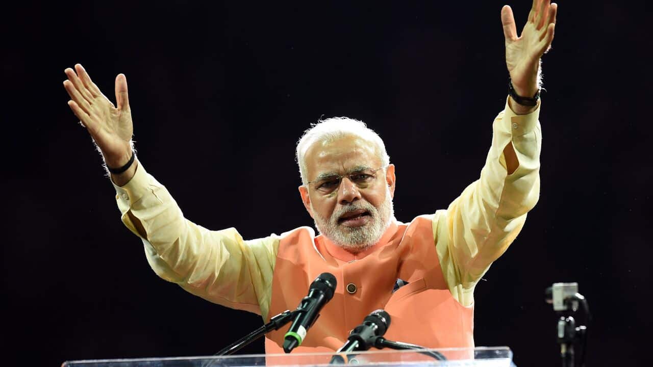 Prime Minister Narendra Modi of India speaks to supporters during a community reception September 28, 2014 at Madison Square Garden in New York. Modi received a rock star reception as thousands cheered on the new right-wing leader in a packed arena. (AFP