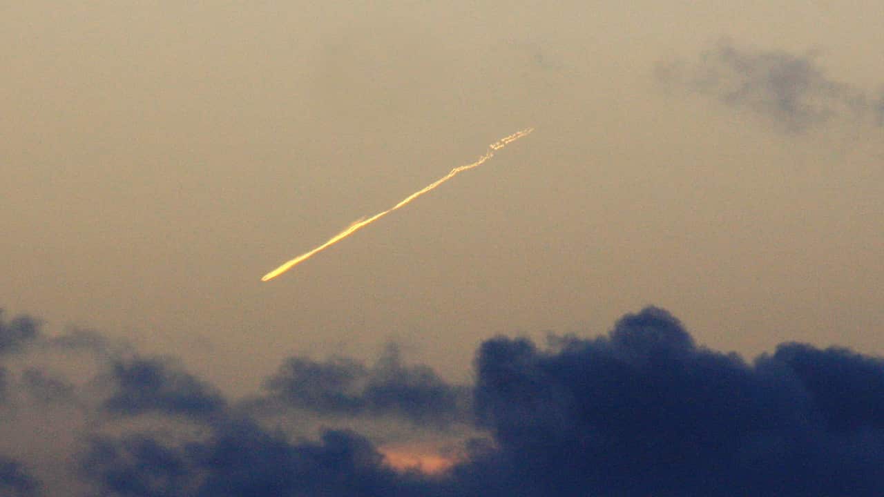 A sighting of Tiangong 1 as it re-enters the Earth's atmosphere.