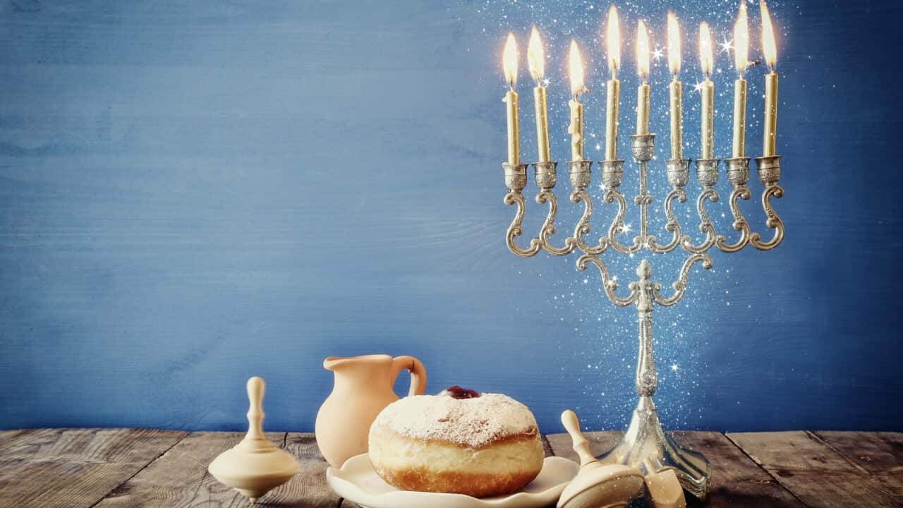 Image of jewish holiday Hanukkah with wooden dreidels