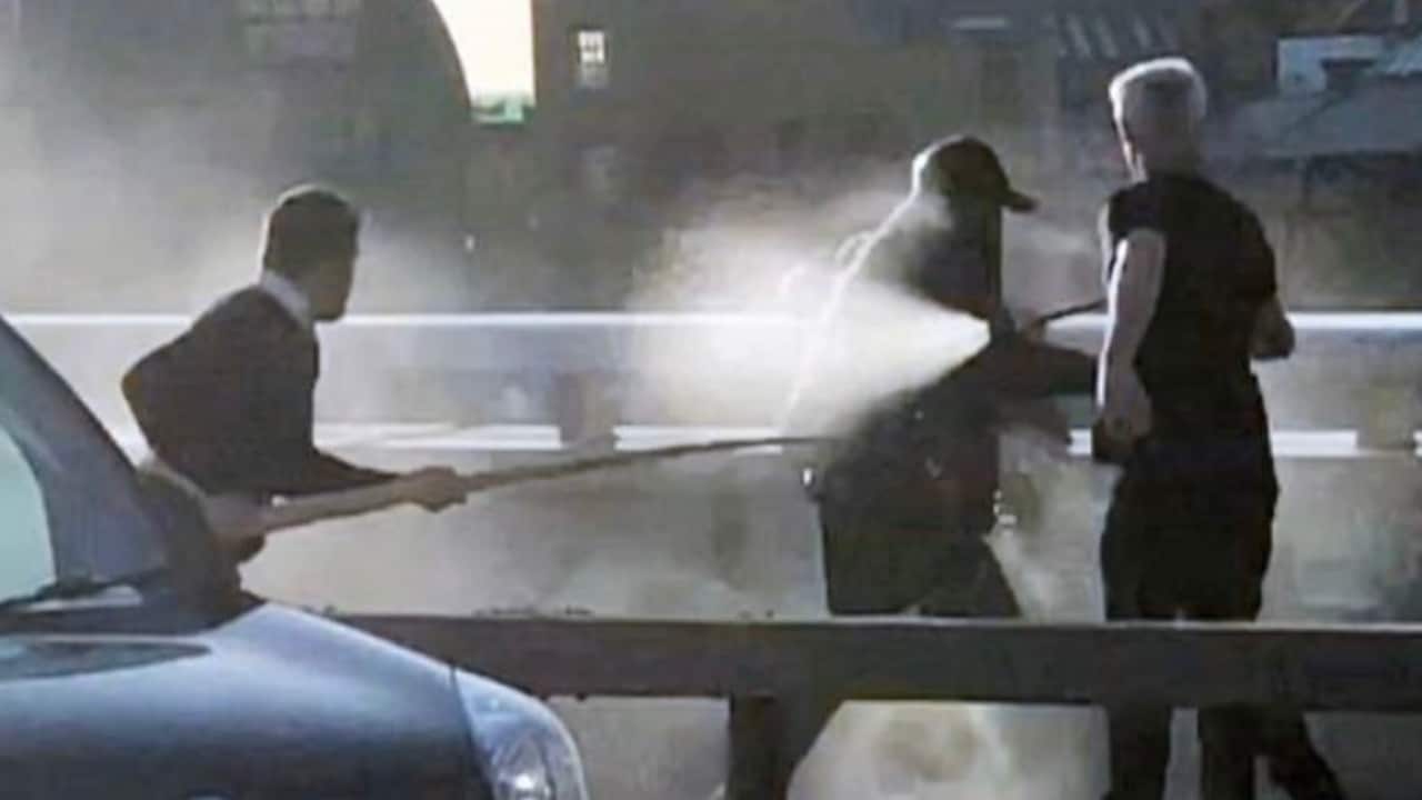 An image which reportedly shows passer-bys stopping the attacker.