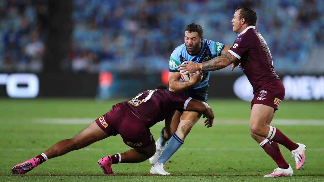 James Tedesco of the Blues runs the ball during Game 2 of the 2020 State of Origin series between the NSW Blues and QLD Maroons at ANZ Stadium in Sydney, Wednesday, November 11, 2020. (AAP Image/Brendon Thorne) NO ARCHIVING, EDITORIAL USE ONLY