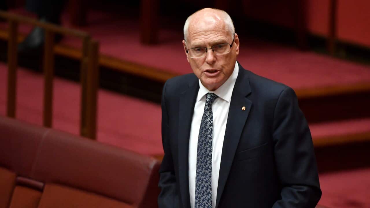 A man wearing a suit