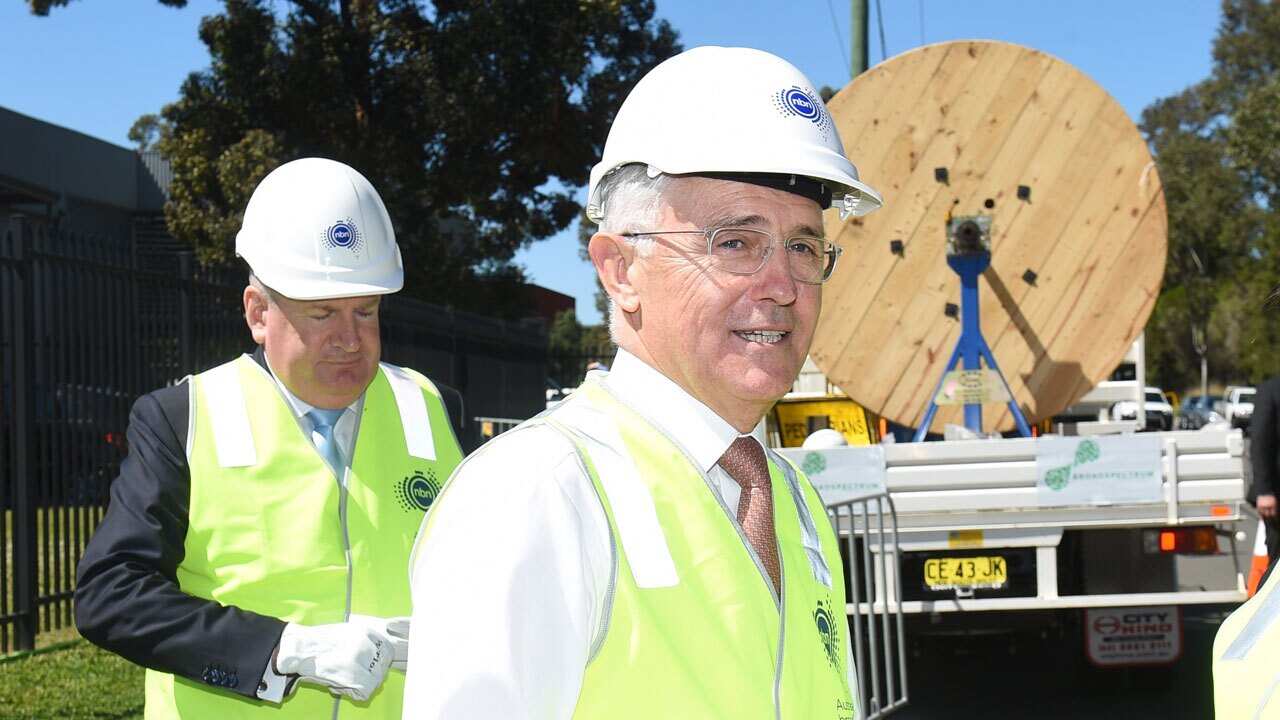 Malcolm Turnbull with Mitch Fifield visiting NBN installation