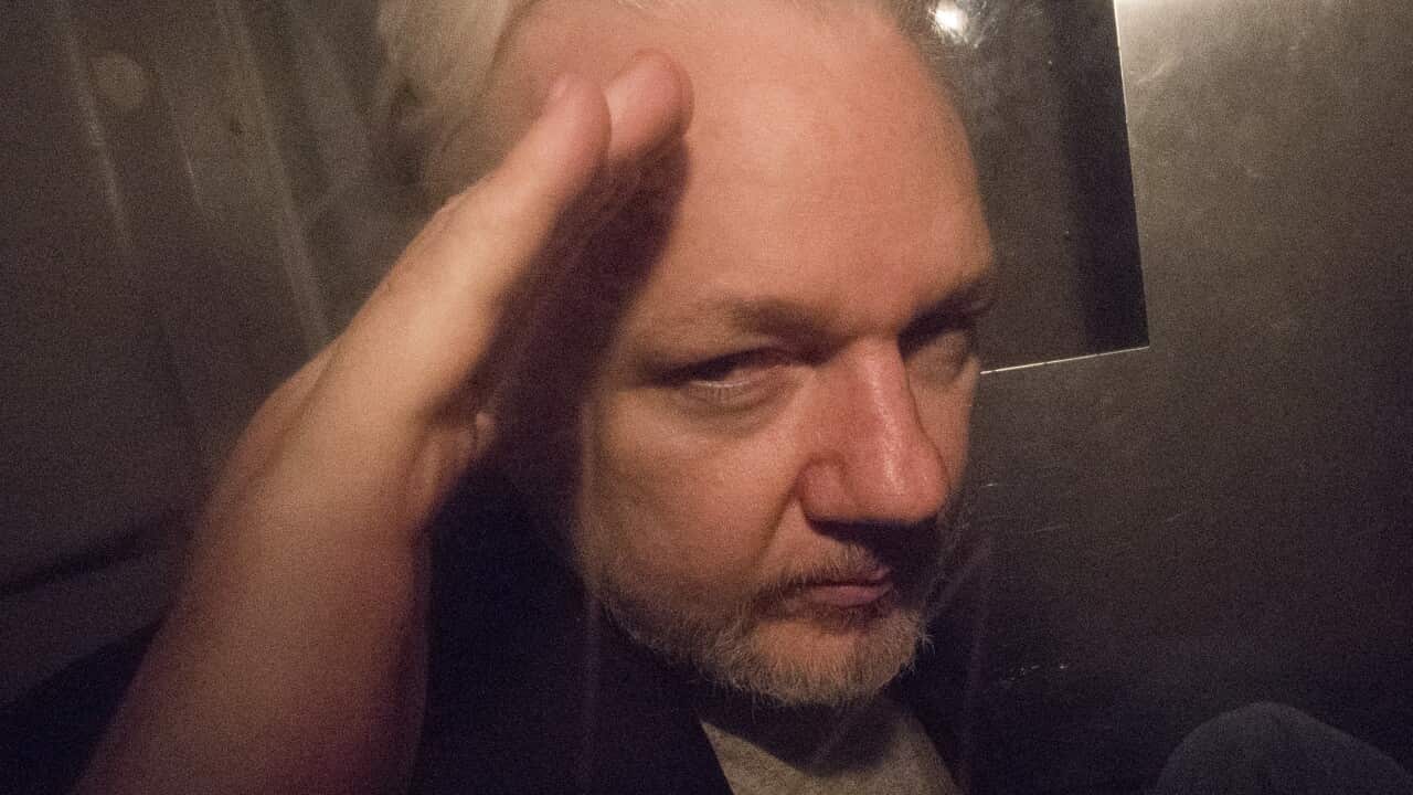 Julian Assange inside a prison van.