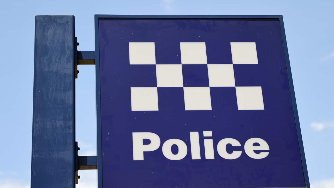 A Police sign is seen outside of Burwood Police Station in Sydney on Wednesday, Nov. 30, 2016. (AAP Image/Paul Miller) NO ARCHIVING