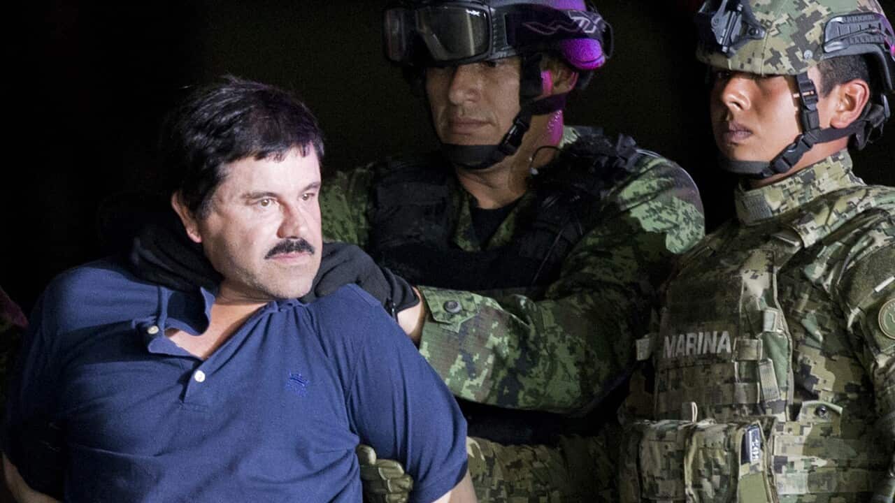 El Chapo under heavy guard by Mexican Marines.