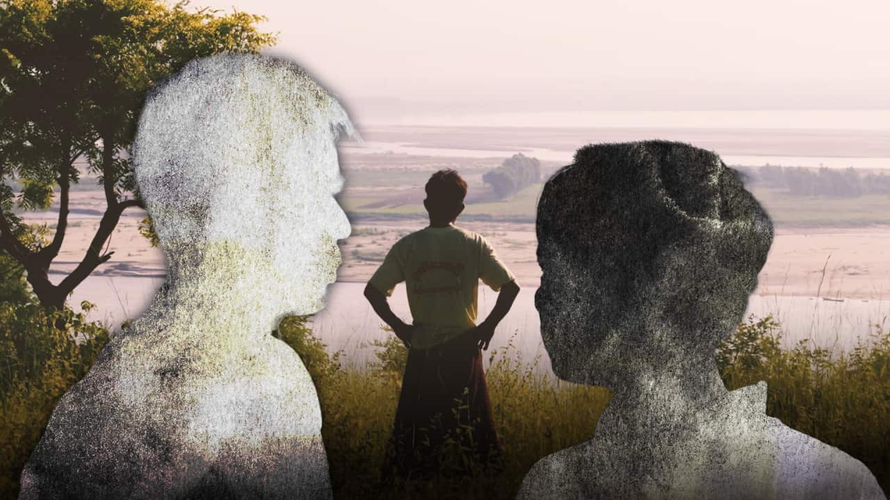 A collage showing a man standing on a grassy riverbank at dusk. Two large, grainy human silhouettes, one light and one dark, face each other in the foreground
