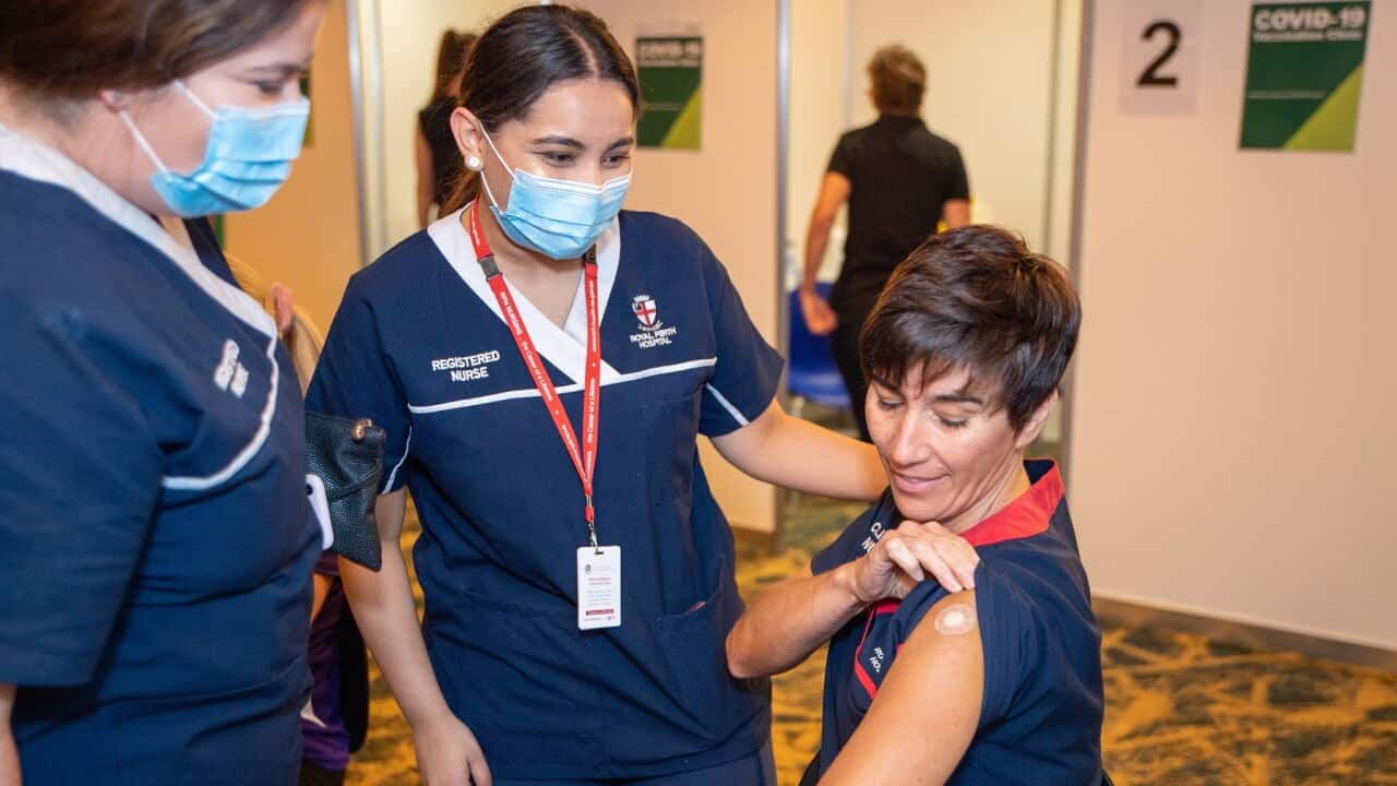 Nurse Antonia Garza has just received the Pfizer coronavirus vaccine in Perth