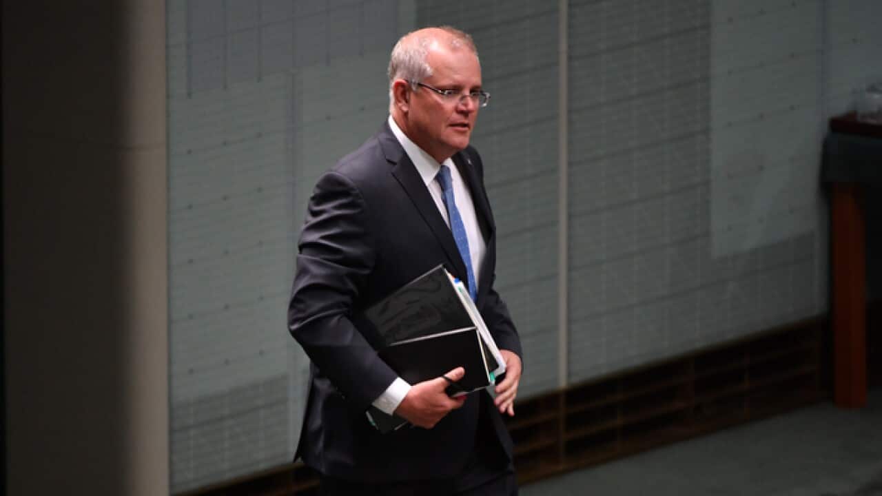 Prime Minister Scott Morrison arrives for Question Time in the House of Representatives